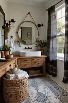 Achieve a calming, earthy look with neutral boho farmhouse bathroom decor 🌱🛁. Use a mix of beige, white, and natural wood elements for a serene, cohesive space. Add bohemian accents like tassel curtains and patterned towels for extra charm ✨. #NeutralDecor #BohoFarmhouse #RusticElegance #BathroomIdeas Earthy Powder Room Ideas, Boho Bathroom Renovation, Bathroom Remodel Boho, Beige Wall Bathroom, Boho Farmhouse Bathroom Decor, Bathroom Decor Neutral, Boho Farmhouse Bathroom, Patterned Towels, Small Farmhouse Bathroom