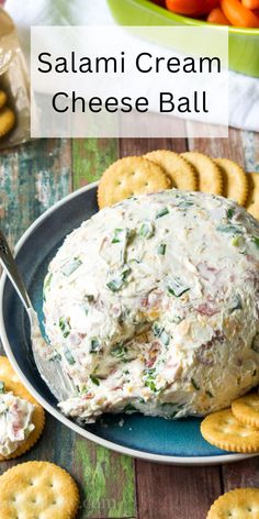 a bowl filled with cream cheese and crackers