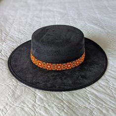 Black Felt Hat With Orange And Yellow Handwoven Beaded Band. New, Never Worn, But No Tag. Each Band Takes An Average Of 15 Hours To Make Depending On The Design And Size Of The Art. Elegant Black Hat Band For Festival, Black Adjustable Embellished Hats, Black Beaded Brimmed Hat, Elegant Black Beaded Hat, Beaded Black Festival Hat, Black Beaded Festival Hat, Festival Black Beaded Hat, Black Beaded Hat, Black Felt Hat