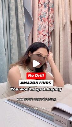 a woman sitting at a table in front of a book with the caption no drill amazon finds you won't forget buying