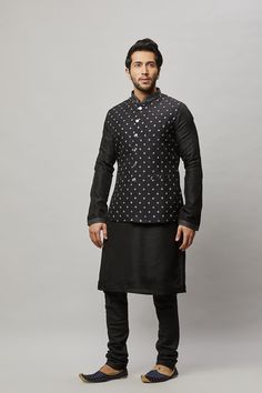 Cotton Linen blended kurta with contrast thread embroidered vest plus contrasting churidar. The cotton-linen blend makes it one of our lightest and most breathable kurtas. Crafted with a collar neckline, full sleeves, and front button closure. Occasion: Can be worn to events like Sangeet, Mehendi, & Wedding WASH CARE INSTRUCTIONS - Please Dry clean only when it is applicable. Slight color variation is possible due to digital photography. Traditional Black Cotton Bandhgala, Cotton Nehru Jacket With Resham Embroidery, Traditional Black Cotton Nehru Jacket, Transitional Cotton Nehru Jacket With Chikankari Embroidery, Transitional Sleeveless Cotton Kurta, Cotton Nehru Jacket Straight Kurta For Festivals, Cotton Nehru Jacket For Festivals, Sleeveless Cotton Kurta For Eid, Sleeveless Cotton Kurta