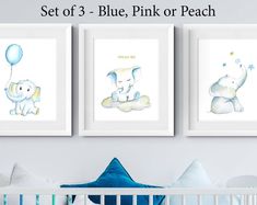 three framed pictures of elephants and a baby's crib with the words set of 3 blue, pink or peach