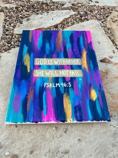 a painting on the ground that says, god is within here she will not fail