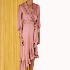 The Zimmerman Silk Wrap Midi Dress In Dusty Pink From Our Fall 2023 Collection, Luminosity. A Silk Midi Dress Featuring A Wrap Front Silhouette, Blouson Sleeves With Elongated Cuffs And Asymmetric Skirt. Silk Midi Dress Wrap Front Asymmetric Ruffled Mini Skirt Blouson Sleeves With Elongated Cuffs, Brand New, Home Free Of Smoke And Pets Pre-draped V-neck Silk Dress, Spring Pre-draped Fitted Silk Dress, Luxury Pink Midi Dress, Feminine Formal Viscose Midi Dress, Formal Feminine Midi Dress In Viscose, Formal Feminine Viscose Midi Dress, Fitted Pre-draped Viscose Dresses, Elegant Pink Silk Evening Dress, Elegant Pink V-neck Wrap Dress