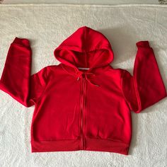 Candy Apple Red Zip Down Cropped Hoodie From Shein In Size Small Drawstring Thermal 100% Polyester Long Sleeve Slight Stretch Brand New Without Tag Trendy Red Top With Drawstring Hood, Red Hooded Tops For Spring, Trendy Red Hoodie For Fall, Red Hoodie Sweatshirt, Red Spring Hoodie Top, Red Stretch Hooded Sweatshirt, Red Hoodie For Spring, Red Fitted Sporty Hoodie, Sporty Fitted Red Hoodie