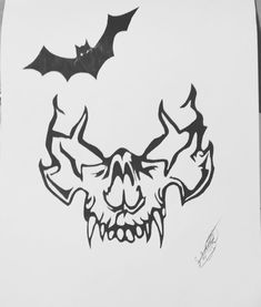 a drawing of a bat with fangs on it