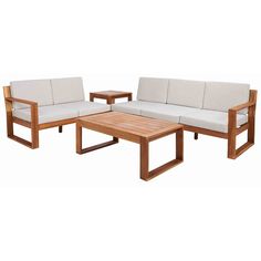 three pieces of wood with white cushions and two coffee tables on each side, all in the same color