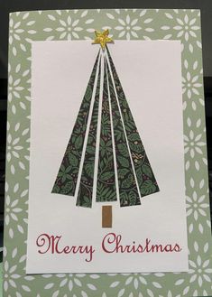 a card with a christmas tree on it