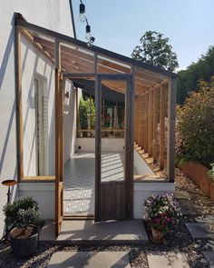 the instagram page shows an image of a small house with glass doors and windows