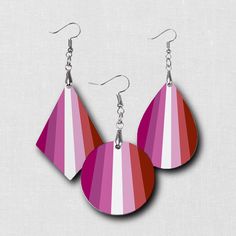 Express your pride, style and make a statement with our beautiful and fashionable unique LGBTQ earrings. Our hardboard wood earrings have a vibrant image printed on both sides. Want a custom flag, let us know.Be sure to check out the other items in our LGBTQ Pride collection! Earrings are hypoallergenic and lightweight with a glossy finish. Fishhooks are made of Zinc Alloy.Choose from teardrop, round or diamond shape to match your fashion, mood, style or outfit! Makes a perfect gift for someone