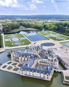 an aerial view of a castle in france