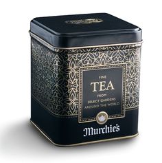 a tea tin with the word murchies printed on it's front and side