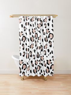 a shower curtain with black and white animal print