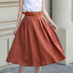 This skirt can be a basic piece in your wardrobe. Due to its classic cut and rich solid color it can be easily matches with many different styles. You'll feel ultra chic and modern wearing the A Line skirt throughout the year. More colors: https://etsy.me/3vRhxU6 DETAIL * 100% Linen  * Two side deep pockets * Right Hidden Zipper closure * Belt loops * Below the knee length effect * Perfect for Summer and spring and autumn * Machine Washable in Warm/Cold Water/Do not bleach /Mid-iron /Hang Dry *T Orange Skirt With Pockets For Spring, Orange Skirt For Workwear In Summer, Summer Pleated Flowy Pencil Skirt, Spring Long Pleated Pencil Skirt, Summer Brown Lined Skirt, Orange Workwear Skirt For Spring, Spring Orange Skirt With Pockets, Brown Flared Mini Skirt For Summer, Lined Long Skirt