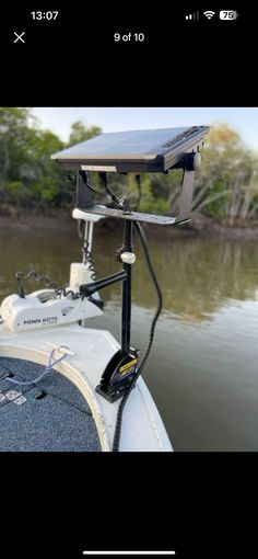 a boat with a solar panel attached to it