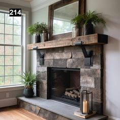 a stone fireplace with potted plants on the mantle