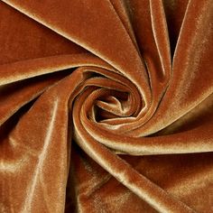 a close up shot of a brown velvet fabric