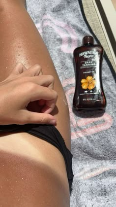 Hawaiian tropic tanning oil #tanning #tanningoil Good Tanning Oil, Tan Line Beach Aesthetic, Summer Tanning Routine, Best Tanning Products For Pale Skin, Tanning Products Aesthetic, Self Tanning Aesthetic, Tanning Lotion Aesthetic, Aesthetic Tanning Pictures