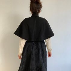 This wonderful textile is an antique French capelet, dating to the late 1800s. The black material is a beautiful textured silk blend fabric. This textile would have been worn about the shoulders as a stylish accent. It fastens at the neck with 2 metal hook and eye clasps. The collar is lined with a heave linen to keep it stiff, you can see it becuase the black fabric has come loose at the back of the neck. The rest of the cape is not lined, but the simple seams are reinforced with a kind of nett Formal Black Capelet, Black Capelet For Costume, Elegant Black Formal Capelet, Fitted Black Capelet, Black Fitted Capelet, Elegant Black Capelet For Costume, Victorian Capelet, Lace Apron, French Workwear