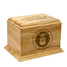 a wooden box with an emblem on it