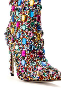 **FINAL SALE - NO EXCHANGES OR RETURNS** Our AZALEA WANG Poppy Multicolored Jewel Heeled Boots are EVERYTHING! These shoes feature a pointed toe silhouette with a zipper enclosure and a stiletto heel. There are jewel-toned rhinestone gems covering the shoe from top to bottom for maximum shine. These statement boots are definite show-stoppers that are perfect for any glamorous event or even for going out! Suede upper Pointed toe Stiletto heel 9.25” shaft height 4.5” heel height Bedazzled Shoes Diy, Shoe Hacks, Rita Moreno, Jeweled Heels, Jeweled Shoes, Fantastic Shoes, Azalea Wang, Fun Heels, Sandal Platform