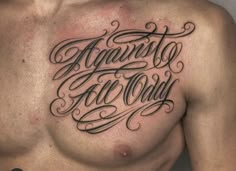 a man with a tattoo on his chest has the words against all odds written in cursive writing