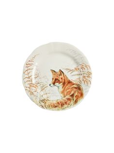 an orange and white plate with a fox on it's side, against a white background