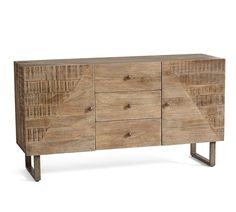 the sideboard is made out of wood and has four drawers