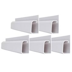 four white plastic door handles with holes on each side