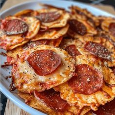 pepperoni and cheese pizzas are on a plate