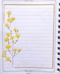 an open notebook with yellow flowers drawn on it