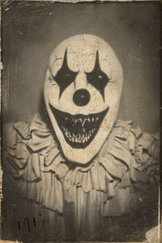 an old photo of a creepy clown