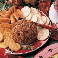 a plate with crackers and cookies on it