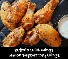 chicken wings with lemon pepper dipping sauce on the side and text buffalo wild wings recipe