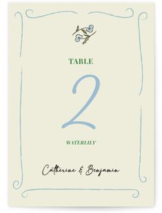 a table number card with the numbers two and three in blue on white, sitting next to each other