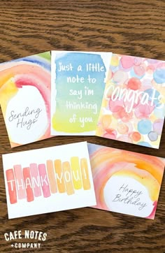 three handmade thank cards with colorful watercolors and the words, just a little note to say i'm thinking of you