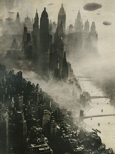 an aerial view of a city in the fog with flying saucers above it and below