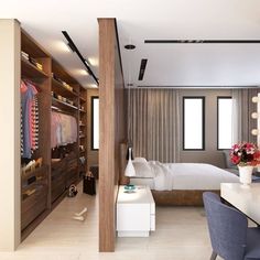 a bedroom with a bed, desk and closet