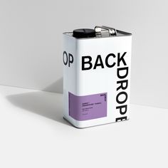 a white can with the words back drop on it and a clipboard attached to it