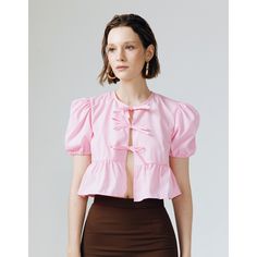 This crop top exuding flair and sophistication, ideal for elevating any ensemble with a dash of refined style.  How to Wear It: High-Waisted Bottoms: Pair with skirts or trousers. Layered: Wear under blazers or jackets. Accessorize: Add statement jewelry for a chic touch. Hand Wash Light Ironing Do Not Bleach Feminine Spring Crop Top, Chic Pink Cropped Top, Feminine Cropped Top For Brunch, Feminine Fitted Crop Top For Day Out, Fitted Cropped Top For Brunch, Feminine Cropped Blouse For Brunch, Chic Cropped Blouse, Elegant Fitted Crop Top For Brunch, Fitted Cropped Feminine Blouse