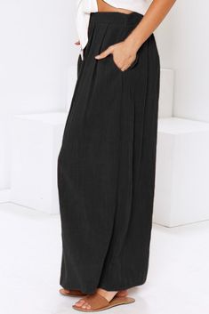 Black Buttoned Maxi Skirt Black Lined Relaxed Skirt Bottoms, Casual Black Maxi Skirt For Work, Solid Color Baggy Long Skirt, Black Elastic Waistband Midi Skirt, Black Maxi Skirt With Elastic Waistband For Work, Casual Black Baggy Skirt, Casual Baggy Black Skirt, Casual Full-length Black Skirt, Wide Leg Black Maxi Skirt For Work