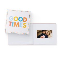 an open photo book with the words good times printed on it