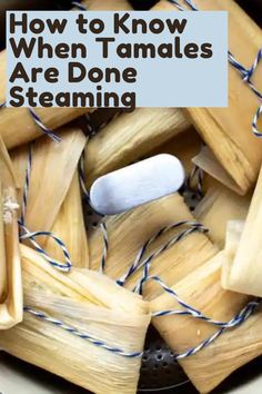 tamales are being steamed in a pan with blue twine around them and the words, how to know when tamales are done steaming