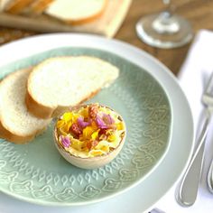 a plate topped with bread and an egg