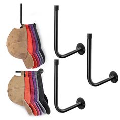 three pairs of socks hanging from hooks