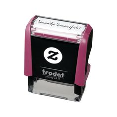 a pink and black stamper with the word steted on it's side