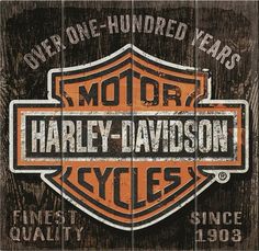 an orange and black harley davidson sign on wooden planks with the words motor, harley - davidson cycles