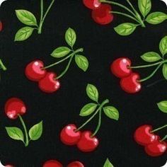 a black background with cherries and green leaves on it, all over the surface