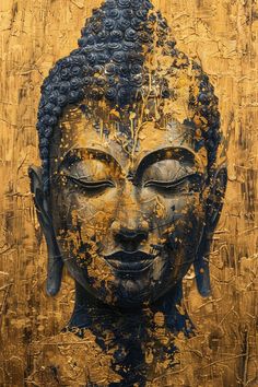 a painting of a buddha head with gold paint on it's face and eyes