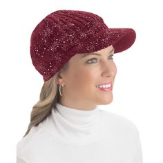 a woman wearing a red hat with sequins